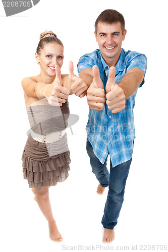 Image of Young happy couple showing ok