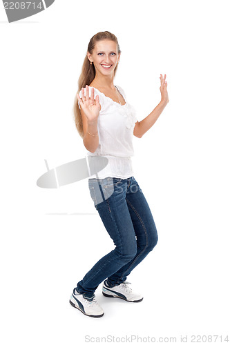 Image of beautiful girl dancing on a white background