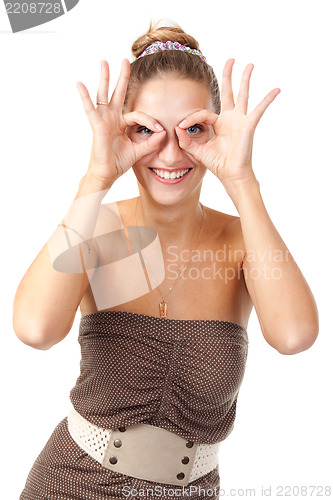 Image of Beautiful girl hamming and shows glasses hands