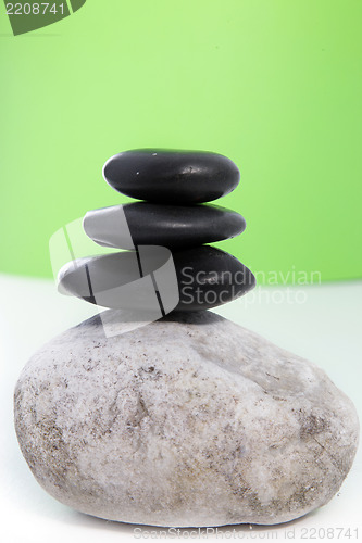 Image of Three black stones stacked on top of each other