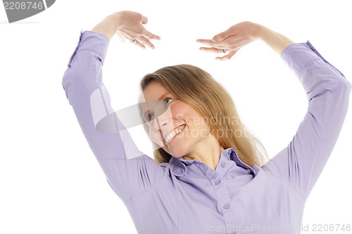 Image of Smiling woman stretching