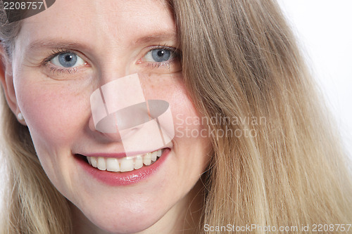 Image of Close up of an attractive woman with blue eyes