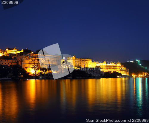 Image of palace on lake in Udaipur India at night