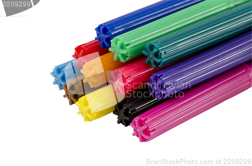 Image of stacked colorful felt tip pen cap isolated white 