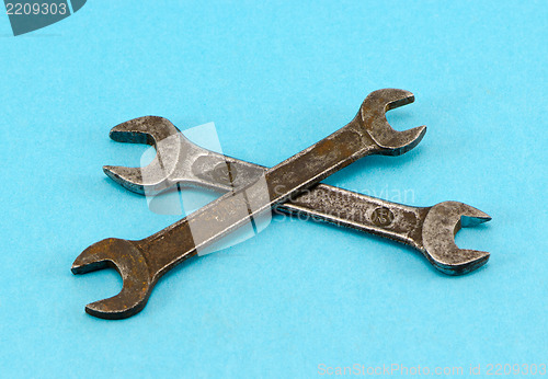 Image of screw spanners wrench tools crossed pair retro  