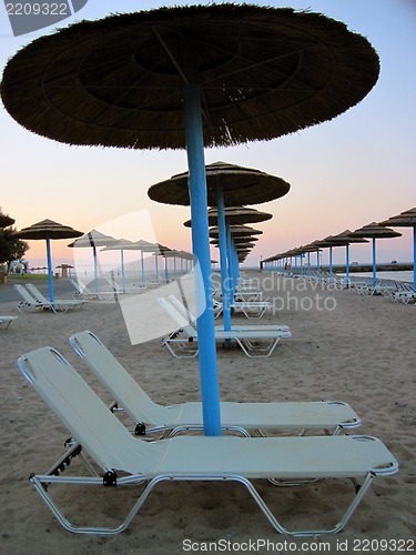 Image of relax chairs on the beach