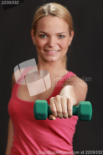 Image of Woman with Dumbbell