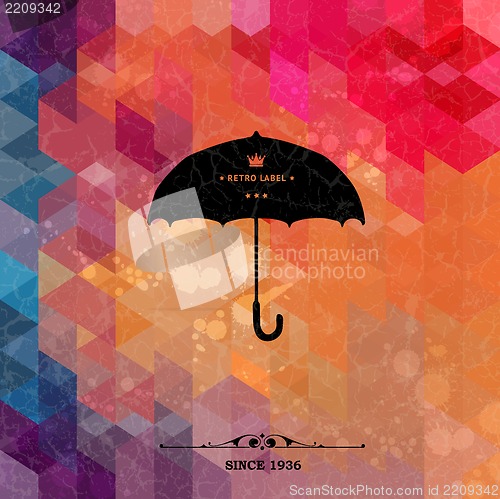 Image of Retro umbrella on colorful geometric background with grunge paper.