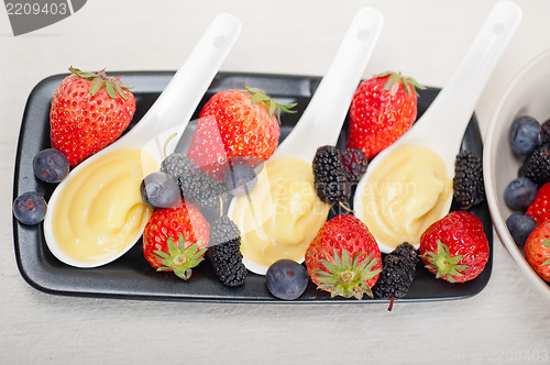 Image of custard pastry cream and berries