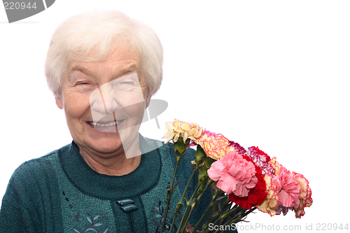 Image of Old woman with flowers