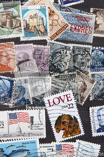 Image of used postage stamps collection background