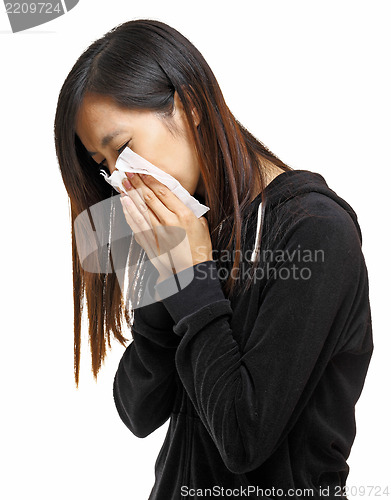 Image of sneezing woman