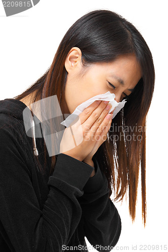 Image of cold sneezing asian woman