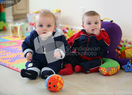 Image of Baby brothers playing