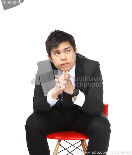 Image of asian business man thinking