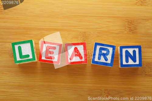 Image of Alphabet Block spell the word learn