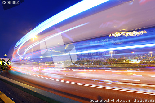 Image of traffic through city at night