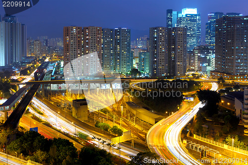 Image of highway and city at night 