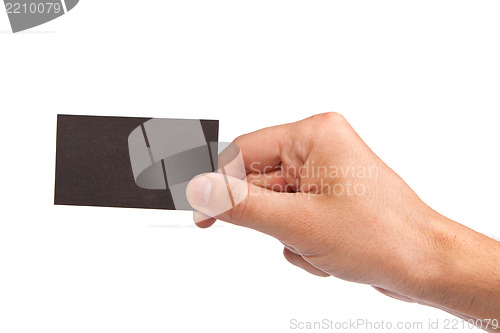 Image of Businessman's hand holding blank business card