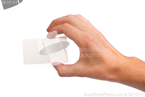 Image of Businessman's hand holding blank business card