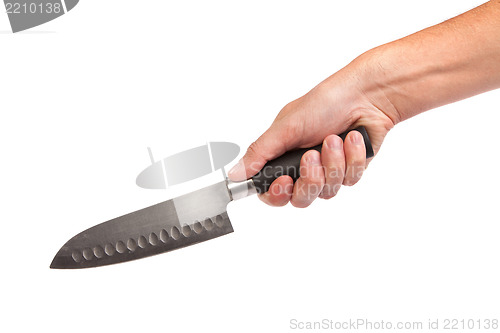 Image of Hand is holding a kitchen kinfe isolated