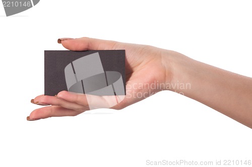 Image of Businesswoman's hand holding blank business card