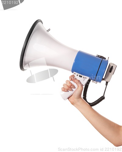 Image of A woman is holding a loudspeaker