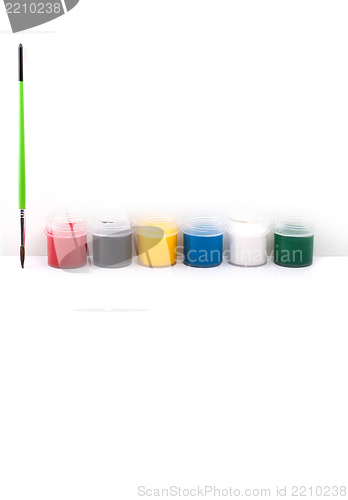 Image of Paints with paintbrush