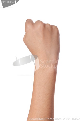 Image of Female hand with a clenched fist isolated