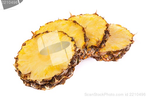 Image of Pieces  of pineapples isolated on white