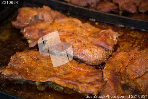Image of Steak and other meat on barbeque. Background