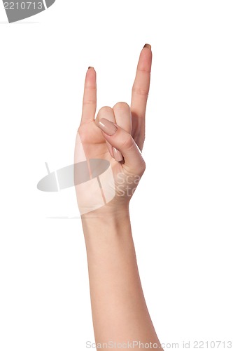 Image of A woman's hand giving the Rock and Roll sign