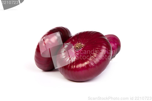 Image of Group of a red onions, isolated on white