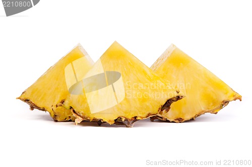 Image of Pieces  of pineapples isolated on white