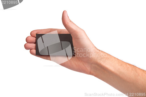 Image of Businessman's hand holding blank business card