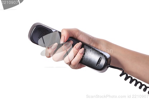 Image of Hand holding an old black telephone tube