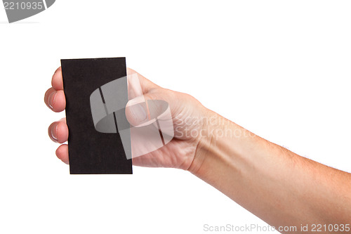 Image of Businessman's hand holding blank business card