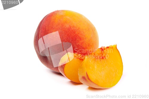 Image of One tasty juicy peache with slices on a white background