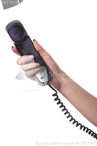 Image of Hand holding an old black telephone tube