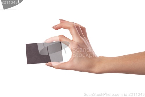 Image of Businesswoman's hand holding blank business card