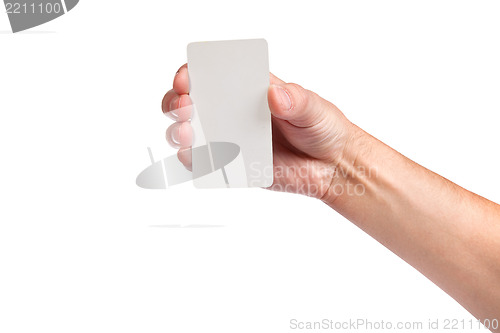 Image of Businessman's hand holding blank business card