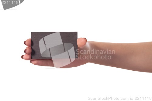 Image of Businesswoman's hand holding blank business card