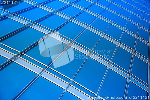 Image of modern blue glass wall of skyscraper