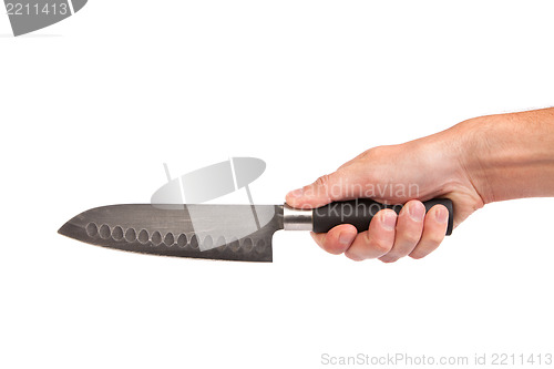 Image of Hand is holding a kitchen kinfe isolated