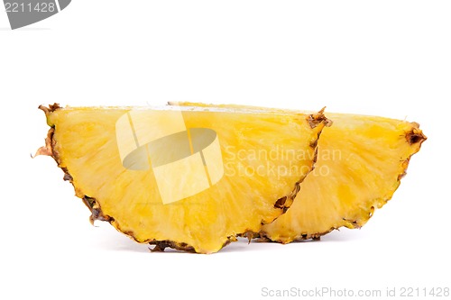Image of Pieces  of pineapples isolated on white