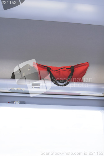 Image of luggages inside an airplane