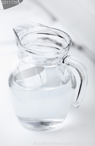 Image of Glass can with water