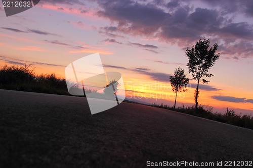 Image of sunset on the road