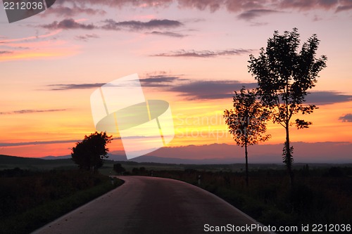 Image of sunset on the road