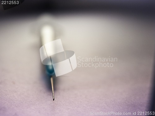 Image of photo of Medical Syringe on matte background